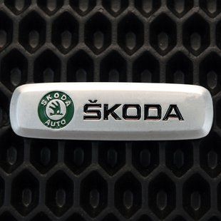 Металевий логотип для автомобільних килимків Skoda 17193-04-44-00 зображення 1